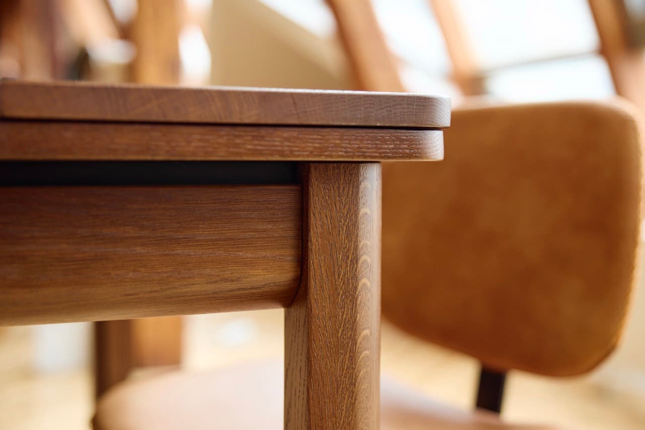Arcadian table close-up showing wood grain texture